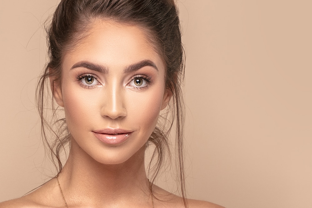 Woman with bright, healthy-looking skin after a VI Peel.