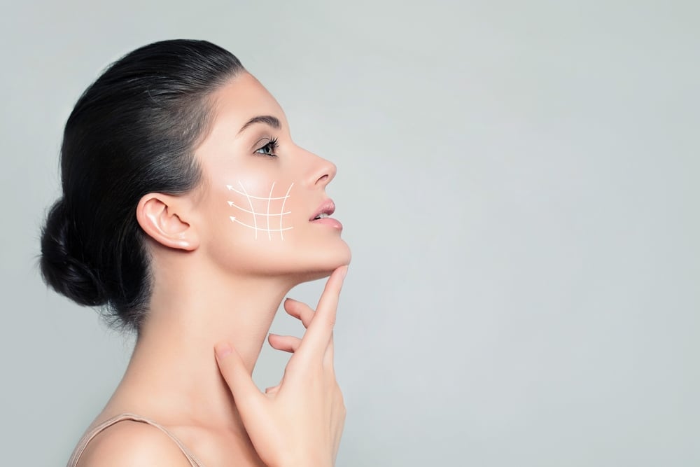 Woman with facial contour lines illustrating skin tightening, collagen support, and long-lasting Sculptra facial rejuvenation results.